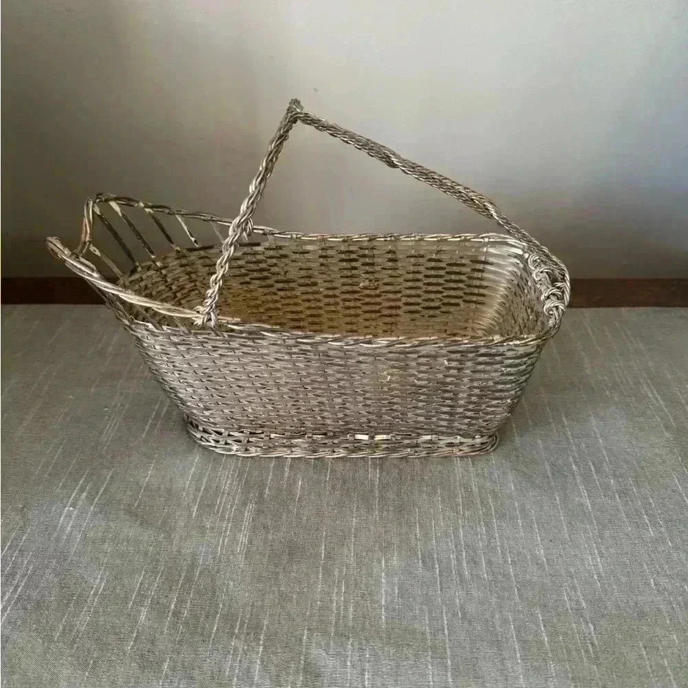 Vintage had made silver plated basket, wine holder holder